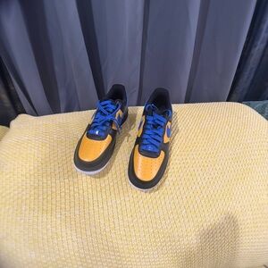 Nike Low-Top Sneakers in Yellow and Blue with Black Accents